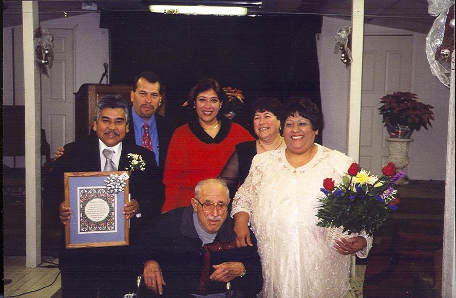 Here she is with her husband, her Brother, two sisters and father.